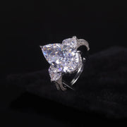 GEM'S BALLET Pear Shape Diamond-fire CZ Cluster Engagement Ring – Elegant Three-Stone Design
