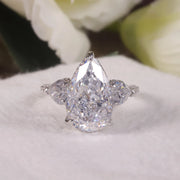 GEM'S BALLET Pear Shape Diamond-fire CZ Cluster Engagement Ring – Elegant Three-Stone Design