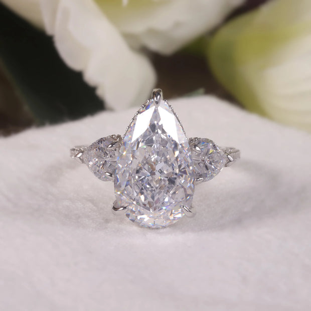 GEM'S BALLET Pear Shape Diamond-fire CZ Cluster Engagement Ring – Elegant Three-Stone Design