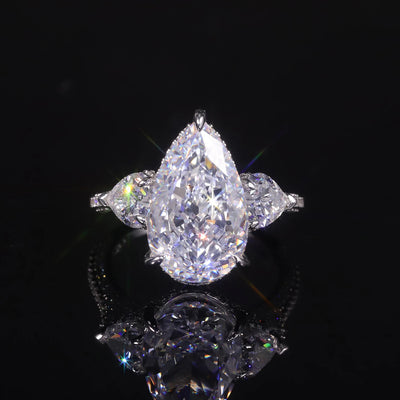 GEM'S BALLET Pear Shape Diamond-fire CZ Cluster Engagement Ring – Elegant Three-Stone Design