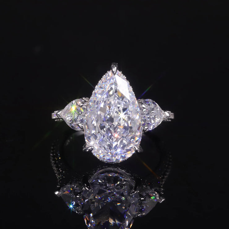 GEM'S BALLET Pear Shape Diamond-fire CZ Cluster Engagement Ring – Elegant Three-Stone Design